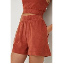 Roxy szorty damskie kolor pomarańczowy gładkie high waist. Brązowe szorty Roxy, bez wzorów, z dzianiny. Za 169.99 zł.
