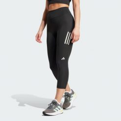 Legginsy Own the Run 3/4. Czarne legginsy adidas, bez wzorów, z materiału. Za 279.00 zł.