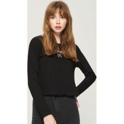 Bluzka cropped - Czarny. Bluzki marki 4f. W wyprzedaży za 19.99 zł.