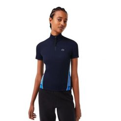 Koszulka damska Lacoste Contrast Bands Zip Neck Polo. Niebieskie t-shirty sportowe Lacoste, m, bez wzorów, z dresówki, bez ramiączek, na golfa. Za 357.00 zł.