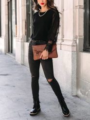 Milan Kiss Bluzka w kolorze czarnym rozmiar: M. Czarne bluzki Milan Kiss, m, bez wzorów, bez kołnierzyka, bez ramiączek. Za 183.15 zł.