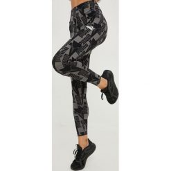 Puma legginsy Power damskie kolor czarny wzorzyste. Czarne legginsy Puma, bez wzorów, z dzianiny. Za 149.99 zł.