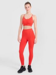 4F Legginsy treningowe bezszwowe damskie - czerwone XS/S. Czerwone legginsy 4f, bez wzorów, z dzianiny, klasyczne. W wyprzedaży za 99.99 zł.