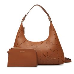 Torebka Calvin Klein. Brązowe torebki klasyczne Calvin Klein, bez wzorów, klasyczne, bez dodatków. Za 899.99 zł.