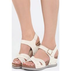 Beżowe Sandały Connection. Sandały marki QUECHUA. Za 49.99 zł.