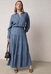 Niebieska Rozkloszowana Spódnica z Lyocellu z Wysokim Stanem i Falbanami Emorithia. Niebieskie spódnice Born2be, na co dzień, bez wzorów, z lyocellu, klasyczne, maxi, koszulowe. Za 99.99 zł.