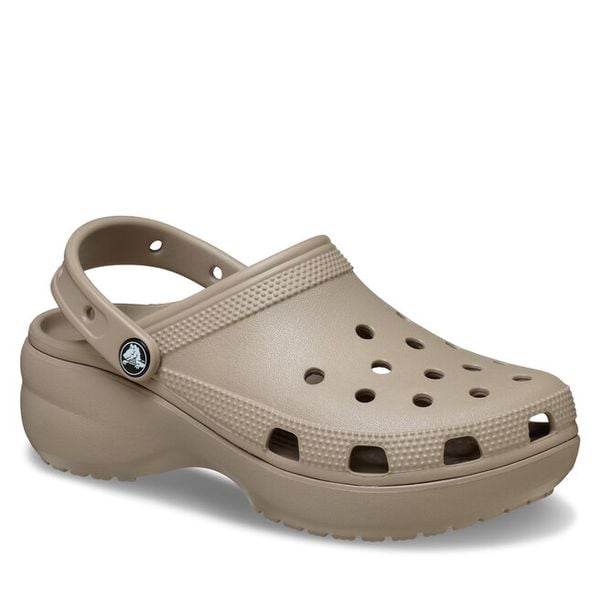 Klapki Crocs. Brązowe klapki Crocs, bez wzorów, bez obcasa, bez zapięcia. Za 189.99 zł.