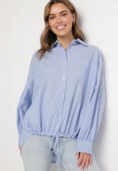 Jasnoniebieska Bawełniana Koszula Oversize w Paski ze Ściągaczem Elineola. Niebieskie koszule Born2be, uniwersalny, bez wzorów, z bawełny, eleganckie, bez kołnierzyka, bez ramiączek. Za 119.99 zł.
