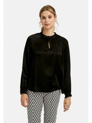 Milano Italy Bluzka w kolorze czarnym rozmiar: 44. Czarne bluzki Milano Italy, bez wzorów, z wiskozy, bez kołnierzyka, bez ramiączek. Za 173.99 zł.