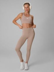 4F Legginsy treningowe szybkoschnące damskie - beżowe S. Brązowe legginsy 4f, bez wzorów, sportowe. Za 119.99 zł.