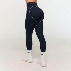 Legginsy damskie fitness z wysokim stanem niebieskie Varsity. Niebieskie legginsy GYMBEAM, bez wzorów, z elastanu, klasyczne, długie. Za 113.90 zł.