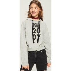 Bluza z nadrukiem - Jasny szar. Bluzy marki DOMYOS. W wyprzedaży za 29.99 zł.