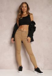 Beżowe Spodnie Skinny Eulalia. Brązowe jeansy Renee, l, bez wzorów, z jeansu, klasyczne, długie. Za 79.99 zł.