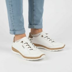 Półbuty damskie Rieker, cholewka ze skóry naturalnej gładkiej sportowa forma klasyczne sznurowanie lekka elastyczna podeszwa, białe, N42K5-80. Białe buty sportowe lifestyle Rieker, bez wzorów, ze skóry, klasyczne, bez zapięcia. Za 369.00 zł.