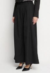 Czarne Spodnie o Fasonie Palazzo z Wsuwanymi Kieszeniami Adivena. Czarne jeansy Born2be, bez wzorów, z jeansu, eleganckie, z podwyższonym stanem, długie. W wyprzedaży za 67.99 zł.