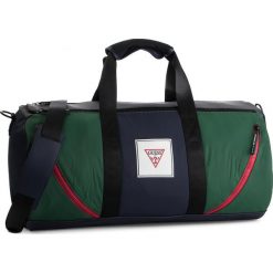 Torba GUESS - College Travel TM6743 POL93 BLM. Niebieskie torby podróżne Guess, z aplikacjami, z materiału. Za 499.00 zł.
