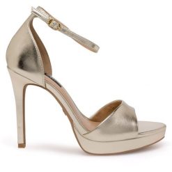 Sandały Nine West. Żółte sandały Nine West, bez wzorów, bez obcasa, na szpilce, bez zapięcia. Za 229.99 zł.