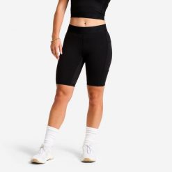 Legginsy fitness cardio damskie Domyos krótkie. Czarne legginsy DOMYOS, bez wzorów, z materiału, klasyczne, krótkie. Za 89.99 zł.