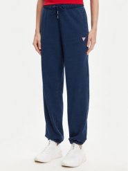 Guess Jeans Spodnie dresowe W5YB65 KCXQ1 Granatowy Regular Fit. Niebieskie spodnie dresowe Guess Jeans, z aplikacjami, z bawełny. Za 269.99 zł.