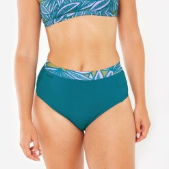 Dół kostiumu kąpielowego surfingowego damski Olaian Rosa. Fioletowe bikini OLAIAN, bez wzorów, z elastanu, sportowe. Za 79.99 zł.