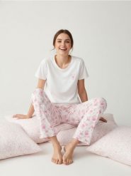 Dwuczęściowa piżama z motywem kokardek i kieliszków - biały. Białe piżamy Sinsay, l, bez wzorów, bez kołnierzyka, bez ramiączek. Za 49.99 zł.