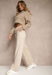 Beżowe Spodnie z Dodatkiem Wiskozy Dresowe High Waist Ellanoria. Brązowe jeansy Renee, bez wzorów, z dresówki, z podwyższonym stanem. W wyprzedaży za 29.99 zł.