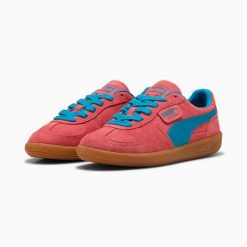 Buty sportowe damskie Puma PALERMO 39646346. Czerwone buty treningowe Puma, bez wzorów, z materiału, bez zapięcia, do piłki nożnej. Za 266.16 zł.