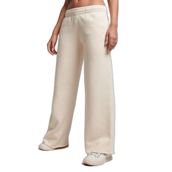 Damskie proste spodnie dresowe w odcieniu wyblakłym Superdry. Szare spodnie dresowe Superdry, bez wzorów, z dresówki, długie. W wyprzedaży za 228.50 zł.