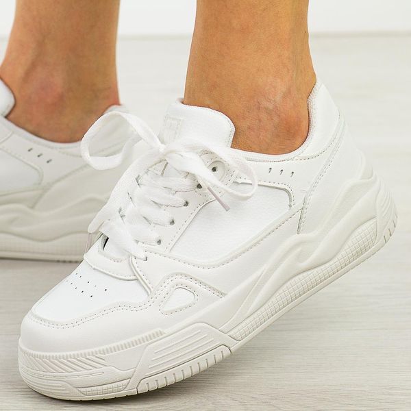Białe sportowe buty damskie Jezzi News 6785. Białe buty sportowe lifestyle Jezzi, na jesień, bez wzorów, z dresówki, biznesowe, bez zapięcia. W wyprzedaży za 111.75 zł.