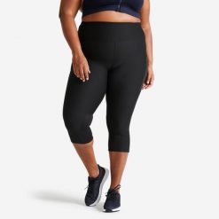 Legginsy fitness damskie Domyos 7/8. Czarne legginsy DOMYOS, bez wzorów, z materiału, sportowe, długie. Za 79.99 zł.
