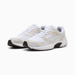 Buty sportowe Puma C25K 40386001. Białe buty treningowe Puma, bez wzorów, bez zapięcia. Za 184.03 zł.