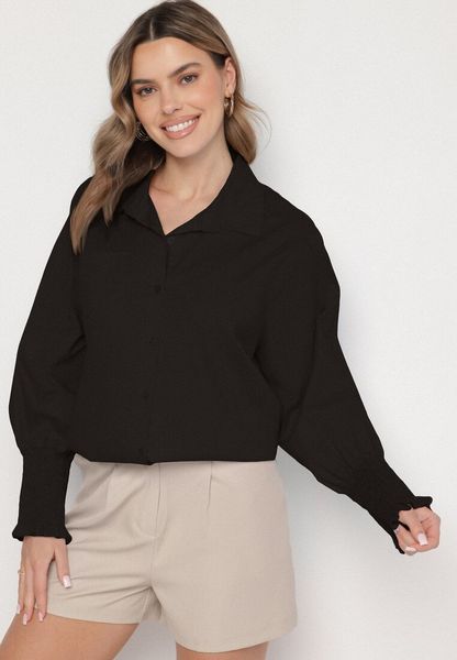 Czarna Bawełniana Koszula z Marszczonymi Rękawami i Falbankami Tanandoria. Czarne koszule Born2be, bez wzorów, z bawełny, eleganckie, bez kołnierzyka, bez ramiączek. Za 79.99 zł.