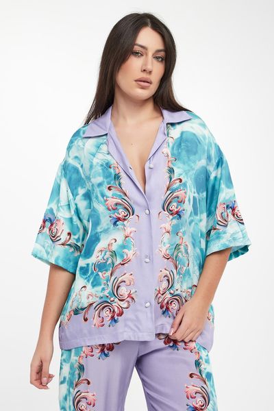 Koszula damska ze wzorem VERSACE JEANS COUTURE. Koszule Versace Jeans Couture, bez wzorów, z jeansu, bez kołnierzyka, bez ramiączek. W wyprzedaży za 1,527.20 zł.