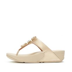 Klapki z platformą z palcem u nogi damskie FitFlop Lulu Ultra-Jewel Metallic. Szare klapki FIT FLOP, bez wzorów, z materiału, eleganckie, bez obcasa, na koturnie, bez zapięcia. Za 633.00 zł.