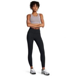 Damskie legginsy do kostek Under Armour Motion. Białe legginsy Under Armour, bez wzorów, z materiału. Za 274.99 zł.