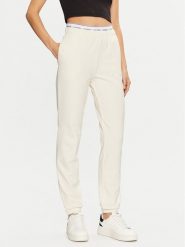 Guess Spodnie dresowe O5RB01 KCO31 Écru Regular Fit. Spodnie dresowe Guess, z aplikacjami, z bawełny. Za 179.99 zł.