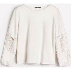 Bluza z podartymi rękawami - Kremowy. Bluzy marki KALENJI. W wyprzedaży za 59.99 zł.