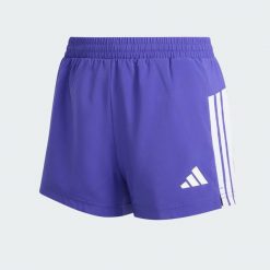 Szorty Train Essentials 3-Stripes Kids. Białe szorty adidas, bez wzorów, z materiału, młodzieżowe. Za 109.00 zł.