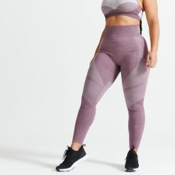 Legginsy fitness bezszwowe damskie Domyos 900. Czerwone legginsy DOMYOS, bez wzorów, z elastanu, sportowe. Za 119.99 zł.