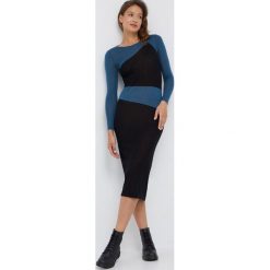 Calvin Klein sukienka wełniana kolor czarny maxi dopasowana. Czarne sukienki Calvin Klein, l, bez wzorów, z dzianiny, bez kołnierzyka, bez ramiączek, maxi, dopasowane. Za 799.99 zł.