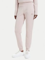 Guess Spodnie dresowe V4YB08 KCAY2 Różowy jasny Regular Fit. Czerwone spodnie dresowe Guess, z aplikacjami, z dresówki. Za 344.99 zł.