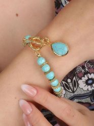 Pierres delicates Pozłacana bransoletka z turkusami rozmiar: onesize. Żółte bransoletki Pierres delicates, z turkusem, pozłacane. Za 46.45 zł.