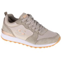 Buty sportowe Sneakersy damskie, Skechers OG 85. Brązowe buty treningowe Skechers, bez wzorów, z materiału, przed kostkę, bez zapięcia, trekkingowe. Za 279.99 zł.