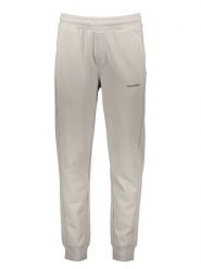 Calvin Klein Spodnie dresowe w kolorze kremowym rozmiar: M. Brązowe spodnie dresowe Calvin Klein, bez wzorów, z bawełny. Za 239.99 zł.