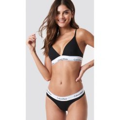 Calvin Klein Stringi Modern Cotton - Black. Stringi marki Calvin Klein. Za 80.95 zł.