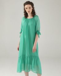 JEDWABNA SUKIENKA Z FALBANĄ. Zielone sukienki Unisono, s, bez wzorów, z jedwabiu, bez kołnierzyka, bez ramiączek, mini, rozkloszowane. Za 269.00 zł.