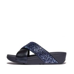 Klapki damskie FitFlop Lulu Crystal-Mix Metallic Cross. Niebieskie klapki FIT FLOP, bez wzorów, bez obcasa, bez zapięcia. Za 477.50 zł.