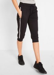 Spodnie sportowe 3/4 z bawełny. Czarne spodnie dresowe bonprix, bez wzorów, z bawełny. Za 92.99 zł.