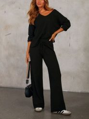 LA Angels 2-częściowy zestaw w kolorze czarnym rozmiar: S. Czarne spodnie materiałowe LA Angels, bez wzorów, z materiału. Za 195.99 zł.