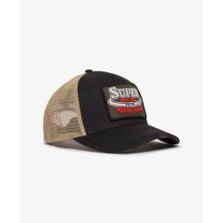 Damska czapka typu trucker Superdry. Niebieskie czapki z daszkiem Superdry, bez wzorów, klasyczne. Za 152.55 zł.